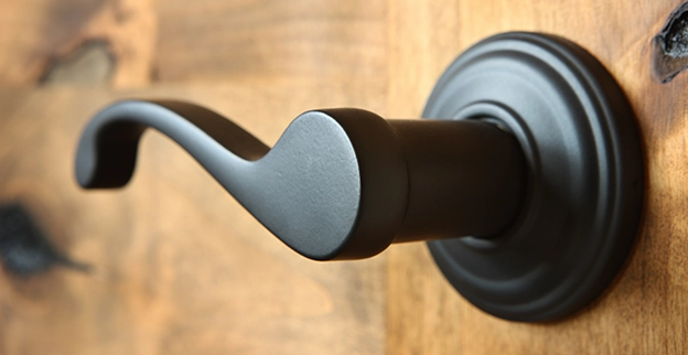 Close-up of a doorknob lever.