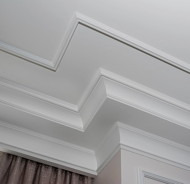 Close-up of an elegant white ceiling.